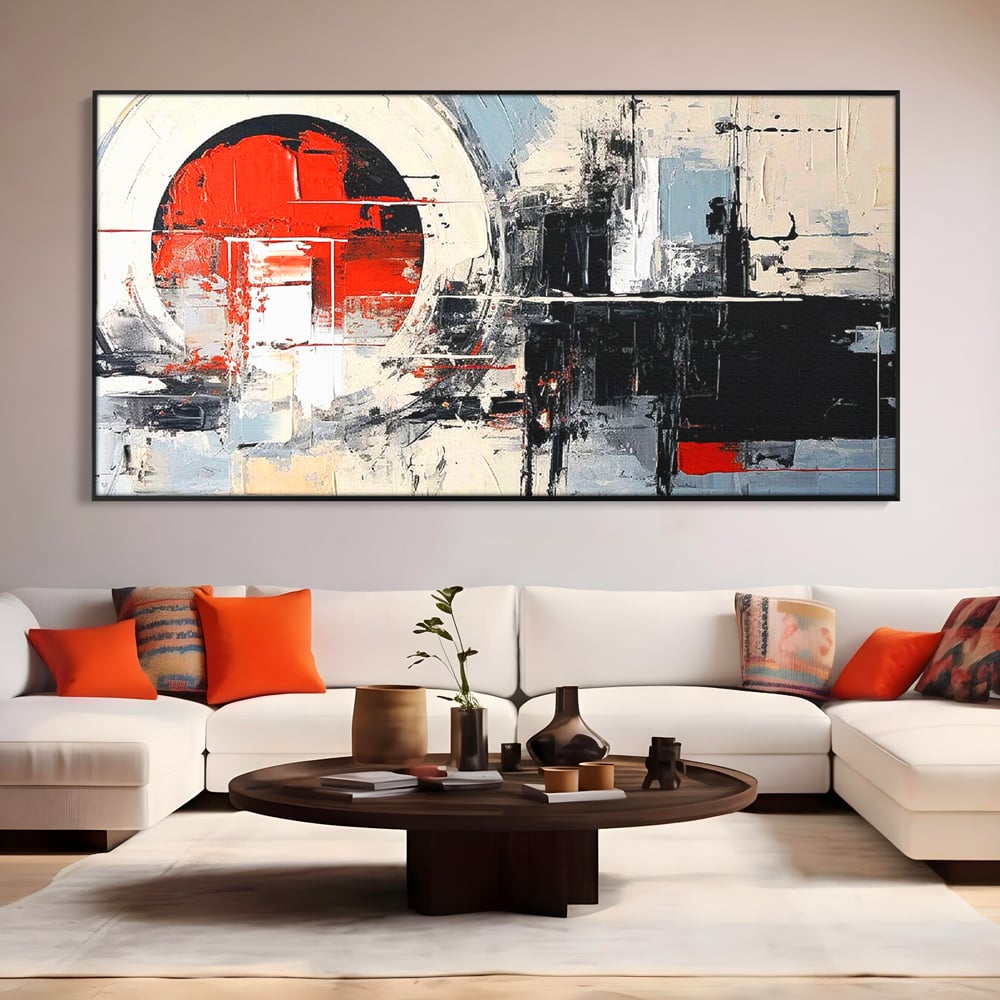 Tablou canvas cu tablou canvas cu cerc rosu si geometrie abstracta, in rama de aluminiu negru, pe perete intr-un living